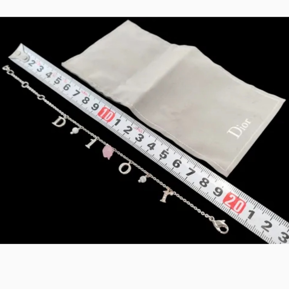 Christian Dior Silver Rose Motif and Rhinestone Logo
Bracelet - Picture 8 of 10